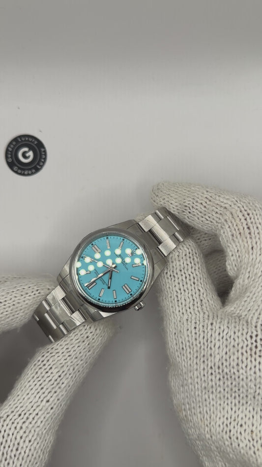 Oyster Perpetual Assembled (100) 41mm 124300 Tiffany Blue Dial